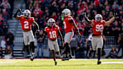 Ohio State Buckeyes defensive back Caleb Downs (2) celebrates with safety Jaylen McClain (18), linebacker Sonny Styles (0) and defensive end Caden Curry (92) after Downs intercepted a pass in the second half at Ohio Stadium on Saturday, Nov. 1, 2025 in Columbus, Ohio.