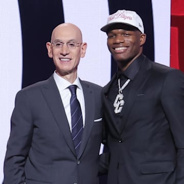 Jun 25, 2025; Brooklyn, NY, USA;  Cedric Coward stands with NBA commissioner Adam Silver after being selected as the 11th pick by the Portland Trail Blazers in the first round of the 2025 NBA Draft at Barclays Center. Mandatory Credit: Brad Penner-Imagn Images