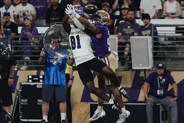 Thaddeus Dixon comes up with one of his two pass break-ups against Weber State.