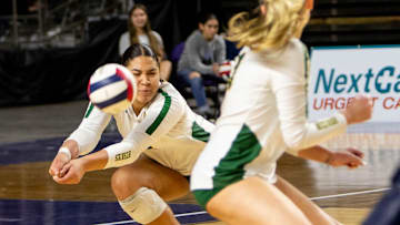 Horizon Huskies outside hitter Teraya Sigler (12) hits the ball against the Millennium Tigers during the 5A state championship game at the Arizona Veterans Memorial Coliseum in Phoenix on Nov. 10, 2023.