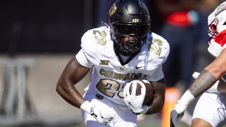 Oct 19, 2024; Tucson, Arizona, USA; Colorado Buffalos running back Isaiah Augustave (23) against the Arizona Wildcats at Arizona Stadium. Mandatory Credit: Mark J. Rebilas-Imagn Images