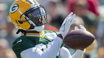 Former Green Bay Packers safety Tarvarius Moore (30) drops a pass during practice at Ray Nitschke Field. 