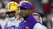 Louisiana State Tigers interim head coach Frank Wilson looks on during warmups prior to the game against the Alabama Crimson Tide at Saban Field at Bryant-Denny Stadium.