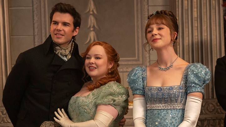 Bridgerton. (L to R) Luke Newton as Colin Bridgerton, Nicola Coughlan as Penelope Bridgerton, Claudia Jessie as Eloise Bridgerton in episode 408 of Bridgerton. 