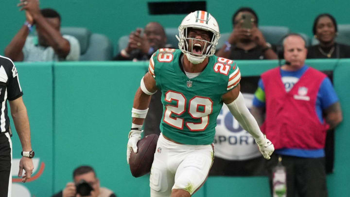 Miami Dolphins safety Brandon Jones (29) celebrates recovering a fumble on the goal line during the first half of an NFL game against the Dallas Cowboys at Hard Rock Stadium in Miami Gardens, Dec. 24, 2023.