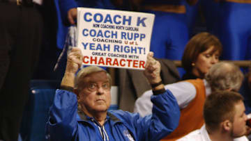 Fan with sign