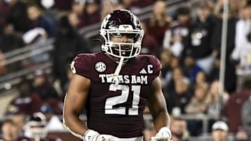 Nov 30, 2024; College Station, Texas, USA; Texas A&M Aggies linebacker Taurean York (21) reacts against the Texas Longhorns during the second half. The Longhorns defeated the Aggies 17-7 at Kyle Field. Mandatory Credit: Maria Lysaker-Imagn Images  