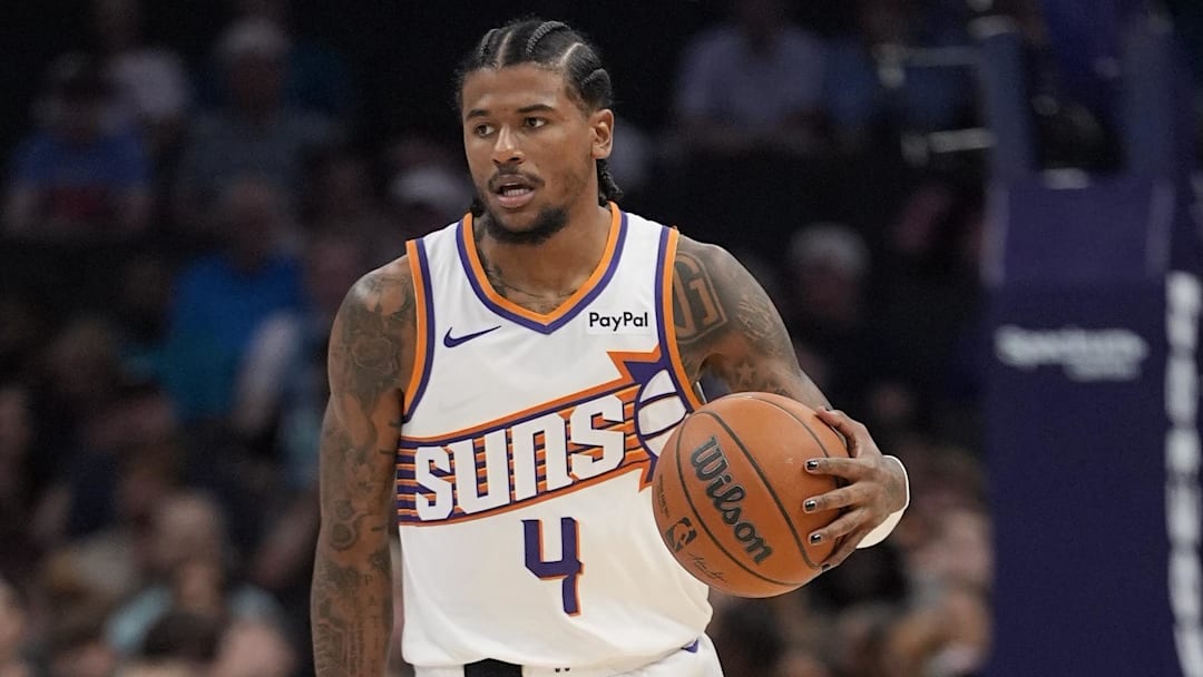 Apr 2, 2026; Charlotte, North Carolina, USA; Phoenix Suns guard Jalen Green (4) brings the ball up court against the Charlotte Hornets during the first quarter at Spectrum Center. Mandatory Credit: Jim Dedmon-Imagn Images