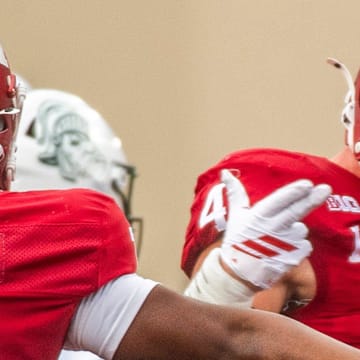 Indiana senior linebacker Aiden Fisher celebrates Oct. 18, 2025, against Michigan State at Memorial Stadium in Bloomington.