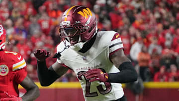 Oct 27, 2025; Kansas City, Missouri, USA; Kansas City Chiefs wide receiver Xavier Worthy (1) is unable to make a reception defended by Washington Commanders cornerback Trey Amos (23) during the first quarter of the game at GEHA Field at Arrowhead Stadium. Mandatory Credit: Denny Medley-Imagn Images