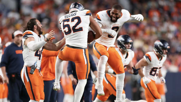 Denver Broncos rookie linebacker Jonah Elliss (52) celebrates a fumble recovery in Sunday night's 27-2 preseason win over the