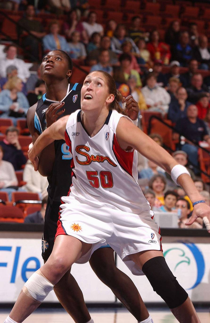 Rebecca Lobo boxes out for Sun