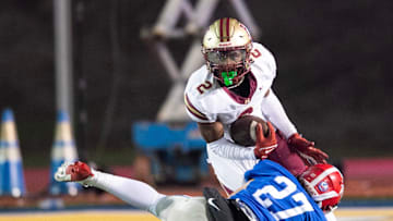 Hartfield's Bralan Womack (2) cuts to get past Prep's Russell Robbins (27) during the MAIS 6A championship at Mississippi College in Clinton, Miss., Saturday, Nov. 23, 2024. Hartfield won by a score of 19-14.