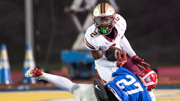 Hartfield's Bralan Womack (2) cuts to get past Prep's Russell Robbins (27) during the MAIS 6A championship at Mississippi College in Clinton, Miss., Saturday, Nov. 23, 2024. Hartfield won by a score of 19-14.