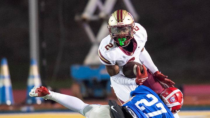 Hartfield's Bralan Womack (2) cuts to get past Prep's Russell Robbins (27) during the MAIS 6A championship at Mississippi College in Clinton, Miss., Saturday, Nov. 23, 2024. Hartfield won by a score of 19-14.