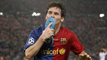 Lionel Messi celebrating after scoring a beautiful header in the 2009 UEFA Champions League Final against Manchester United.