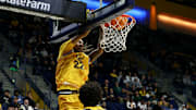 Chris Bell dunks against Sacramento State
