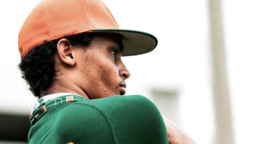 Jacoby Long warming up before a game for the Miami Hurricanes Baseball team.