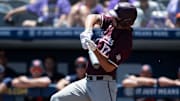 Texas A&M Aggies' Jace LaViolette (17) is hit in the hands by a pitch as Auburn Tigers take on Texas A&M Aggies during the SEC baseball tournament at Hoover Met in Birmingham, Ala., on Thursday, May 22, 2025.
