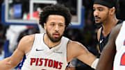 Jan 1, 2025; Detroit, Michigan, USA;  Detroit Pistons guard Cade Cunningham (2) takes the ball up court against the Orlando Magic in the fourth quarter at Little Caesars Arena. Mandatory Credit: Lon Horwedel-Imagn Images