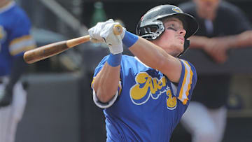 RubberDucks' Travis Bazzana follows a long fly ball to the wall in a game against the Altoona Curve on April 13, 2025, in Akron, Ohio.