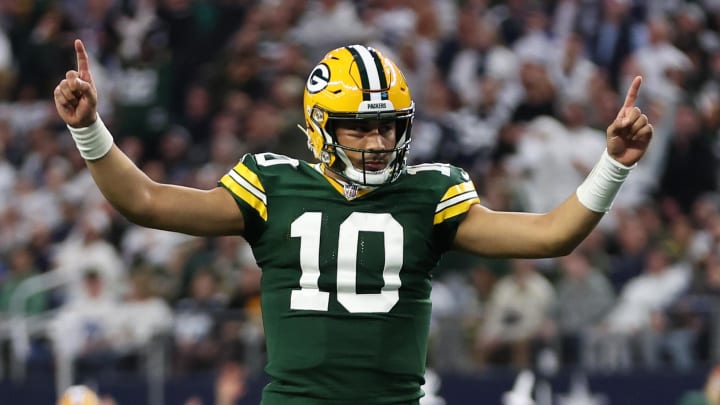 Green Bay Packers quarterback Jordan Love (10) reacts after a touchdown against the Dallas Cowboys in the first quarter for their playoff game AT&T Stadium. 
