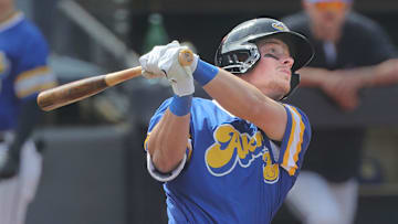 RubberDucks’ Travis Bazzana watches his long fly ball against the Altoona Curve on April 13, 2025, in Akron, Ohio.