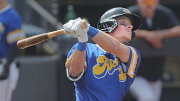 RubberDucks’ Travis Bazzana watches his long fly ball against the Altoona Curve on April 13, 2025, in Akron, Ohio.