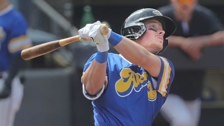 RubberDucks' Travis Bazzana follows a long fly ball to the wall in a game against the Altoona Curve on April 13, 2025, in Akron, Ohio.