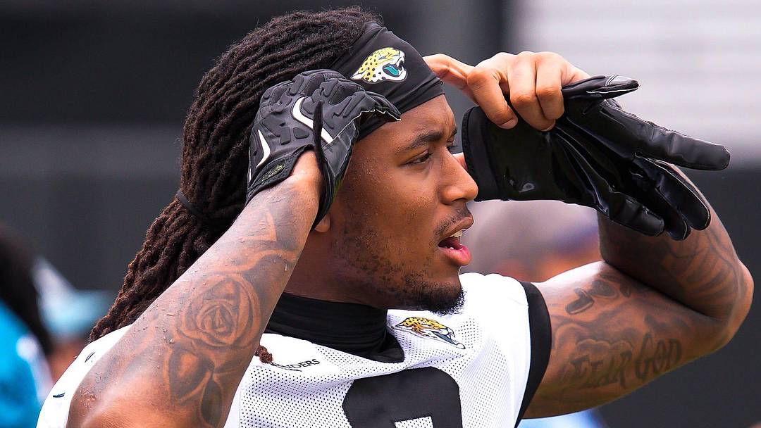Jaguars safety Antonio Johnson (6) asks a teammate for headphones after the Jaguars held their fourth OTA of the year, Monday June 1, 2026 at the Miller Electric Center in Jacksonville, Fla. [Doug Engle/Florida Times-Union]
