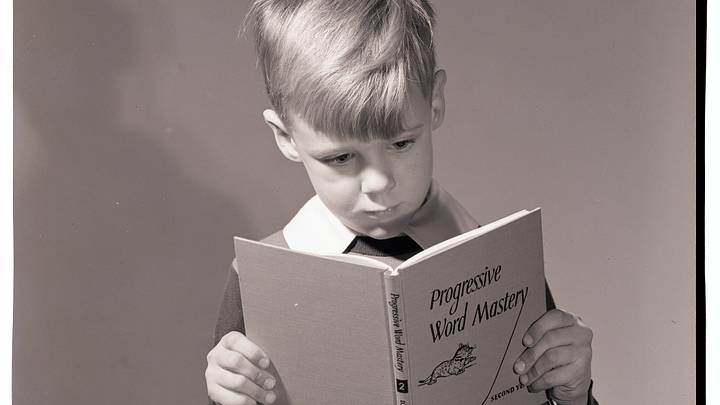 Boy Reading Textbook Boy Reading Textbook