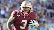 Nov 23, 2024; Tallahassee, Florida, USA; Florida State Seminoles running back Kam Davis (3) runs the ball during the second half of the game against the Charleston Southern Buccaneers at Doak S. Campbell Stadium. Mandatory Credit: Melina Myers-Imagn Images