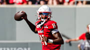 Oct 4, 2025; Raleigh, North Carolina, USA; NC State Wolfpack quarterback CJ Bailey (11) prepares to throw the ball during the first half of the game against Campbell Fighting Camels at Carter-Finley Stadium. Mandatory Credit: Jaylynn Nash-Imagn Images