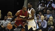 Oct 24, 2014; Memphis, TN, USA; Miami Heat guard Dwyane Wade (3) handles the ball against Memphis Grizzlies guard Tony Allen (9) during the game at FedExForum. Mandatory Credit: Justin Ford-Imagn Images