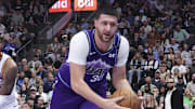 Oct 27, 2025; Salt Lake City, Utah, USA; Utah Jazz center Jusuf Nurkic (30) save a ball against Phoenix Suns center Nick Richards (2) during the second half at Delta Center. Mandatory Credit: Rob Gray-Imagn Images