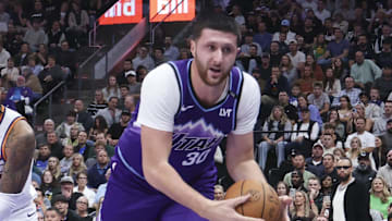 Oct 27, 2025; Salt Lake City, Utah, USA; Utah Jazz center Jusuf Nurkic (30) save a ball against Phoenix Suns center Nick Richards (2) during the second half at Delta Center. Mandatory Credit: Rob Gray-Imagn Images