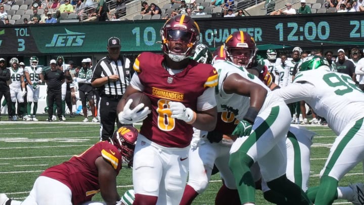 East Rutherford, NJ -- August 10, 2024 -- Michael Wiley scores a Commander TD in the second half as the Washington Commanders came to MetLife Stadium to play the New York Jets in the first press season game of the 2024 season. The Jets topped the Commanders 20-17.