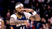 Dec 5, 2024; New Orleans, Louisiana, USA;  New Orleans Pelicans forward Brandon Ingram (14) reacts to making a three point basket against the Phoenix Suns during the first half  at Smoothie King Center. Mandatory Credit: Stephen Lew-Imagn Images