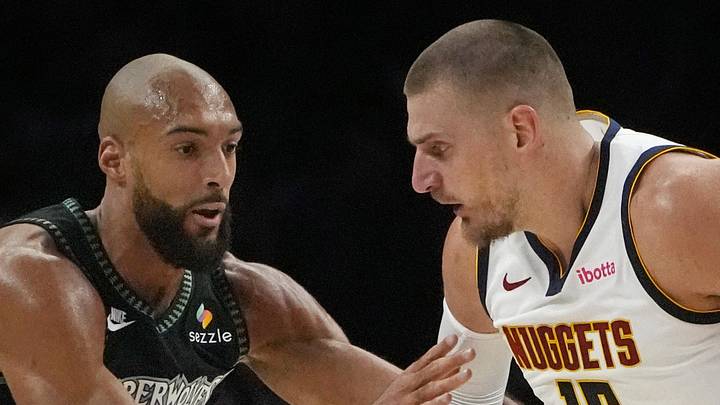 Apr 23, 2026; Minneapolis, Minnesota, USA; Denver Nuggets center Nikola Jokic (15) works around Minnesota Timberwolves center Rudy Gobert (27) in the first quarter at Target Center. Mandatory Credit: Bruce Kluckhohn-Imagn Images