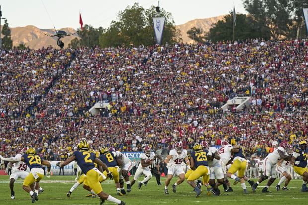 Milroe rushed for 63 yards against Michigan in Pasadena, but he threw for a season-low 116 yards and averaged just 5.0 yards 