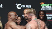 Tyson slaps Paul ahead of their boxing match on Friday night.