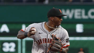 May 21, 2024; Pittsburgh, Pennsylvania, USA;  San Francisco Giants shortstop Marco Luciano (37) throws to first base after recording an out at second base against the Pittsburgh Pirates during the fifth inning at PNC Park. 