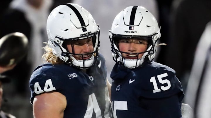 Penn State Nittany Lions tight end Tyler Warren (44) celebrates with quarterback Drew Allar (15) 