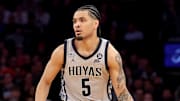 Mar 12, 2025; New York, NY, USA; Georgetown Hoyas guard Micah Peavy (5) brings the ball up court against the DePaul Blue Demons during the second half at Madison Square Garden. Mandatory Credit: Brad Penner-Imagn Images