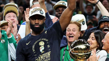 Jun 17, 2024; Boston, Massachusetts, USA; Boston Celtics guard Jaylen Brown (7)  celebrates after winning the NBA Finals MVP after game five of the 2024 NBA Finals against the Dallas Mavericks at TD Garden. Mandatory Credit: Peter Casey-USA TODAY Sports