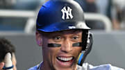 New York Yankees designated hitter Aaron Judge (99) celebrates with team mates in the dugout after hitting a two run home run against the Toronto Blue Jays in the sixth inning at Rogers Centre on July 23. 