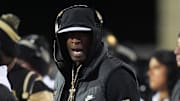 Nov 22, 2025; Boulder, Colorado, USA; Colorado Buffaloes head coach Deion Sanders on the sidelines in the first quarter against the Arizona State Sun Devils at Folsom Field.