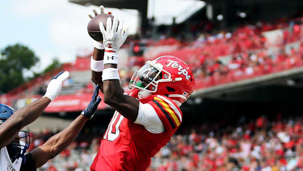 Maryland Terrapins wide receiver Tai Felton makes a touchdown catch over Villanova Wildcats defensive back Zahmir Dawud. 