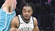 Oct 22, 2025; Charlotte, North Carolina, USA; Brooklyn Nets guard Cam Thomas (24) drives in during the first half against the Charlotte Hornets at the Spectrum Center. Mandatory Credit: Sam Sharpe-Imagn Images