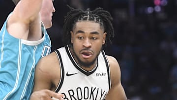 Oct 22, 2025; Charlotte, North Carolina, USA; Brooklyn Nets guard Cam Thomas (24) drives in during the first half against the Charlotte Hornets at the Spectrum Center. Mandatory Credit: Sam Sharpe-Imagn Images
